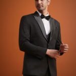 Elegant Man in Black Tuxedo Suit