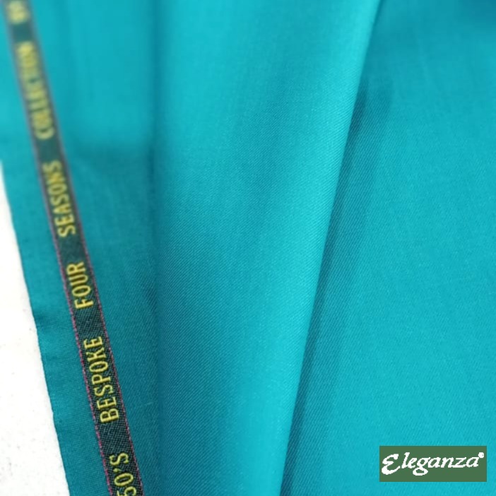 TROPICAL SUITING SEA GREEN HAND MADE £150